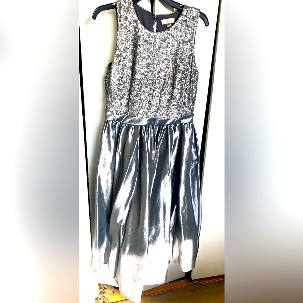 Calvin Klein Silver sequin top with satin bottom tea length dress. Size 12.